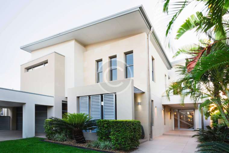 A House with a Massive, Undulating, Wave-Like Exterior